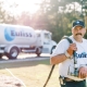 Professional photography of a technician from Euliss Propane pulling a hose from his propane truck